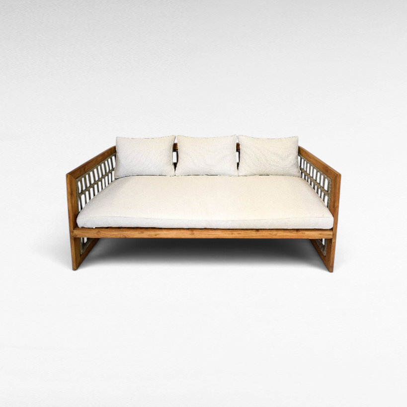 Chora Barefoot Luxury Living teak wood sofa with grey rope detailing and plush white cushions on a white background.