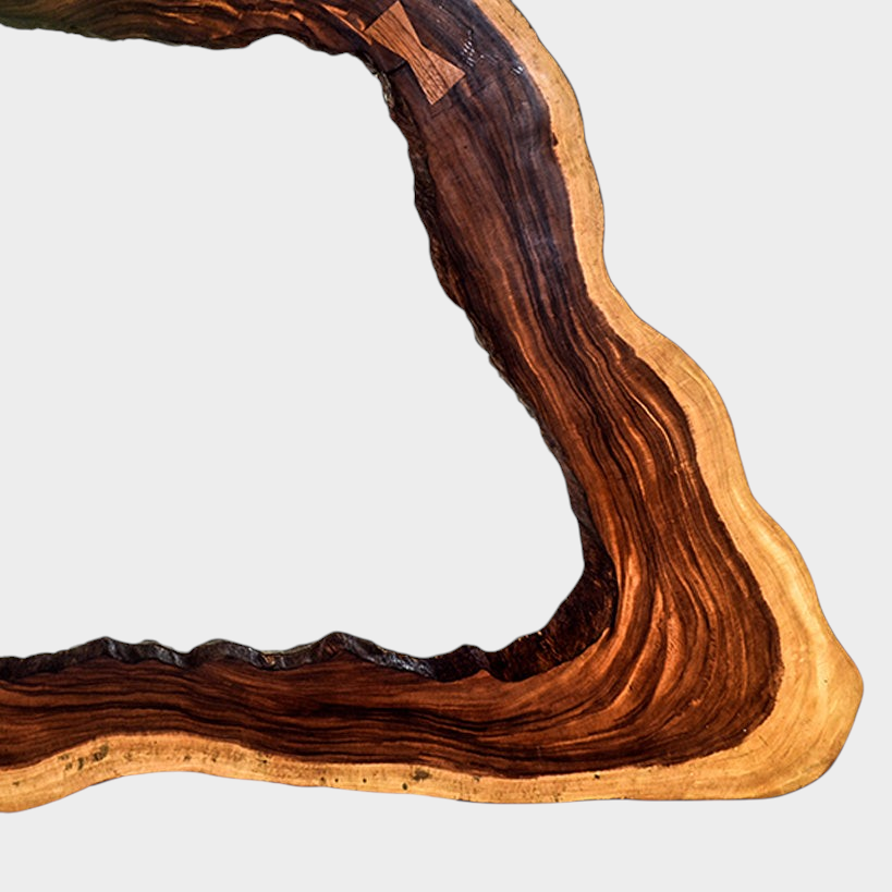 Chora Barefoot Luxury Living mirror frame featuring a natural live edge dark wood border with unique grain patterns.