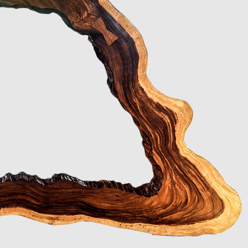 Chora Barefoot Luxury Living teak wood mirror with a unique unshaped organic frame and visible natural wood grain