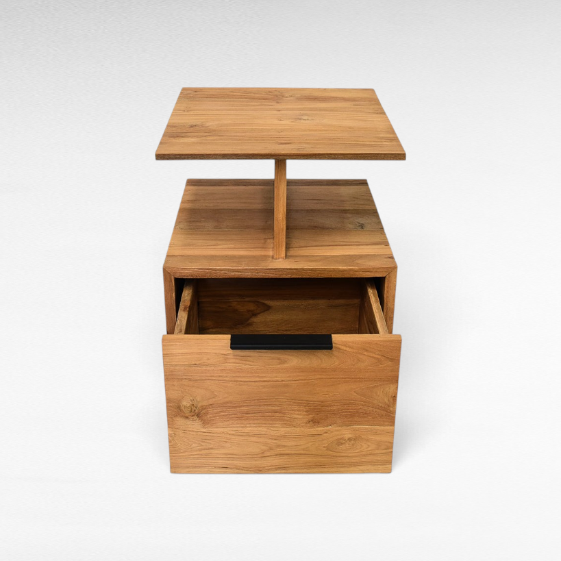 Chora Barefoot Luxury Living handcrafted teak wood bedside table with an open shelf and a single drawer.