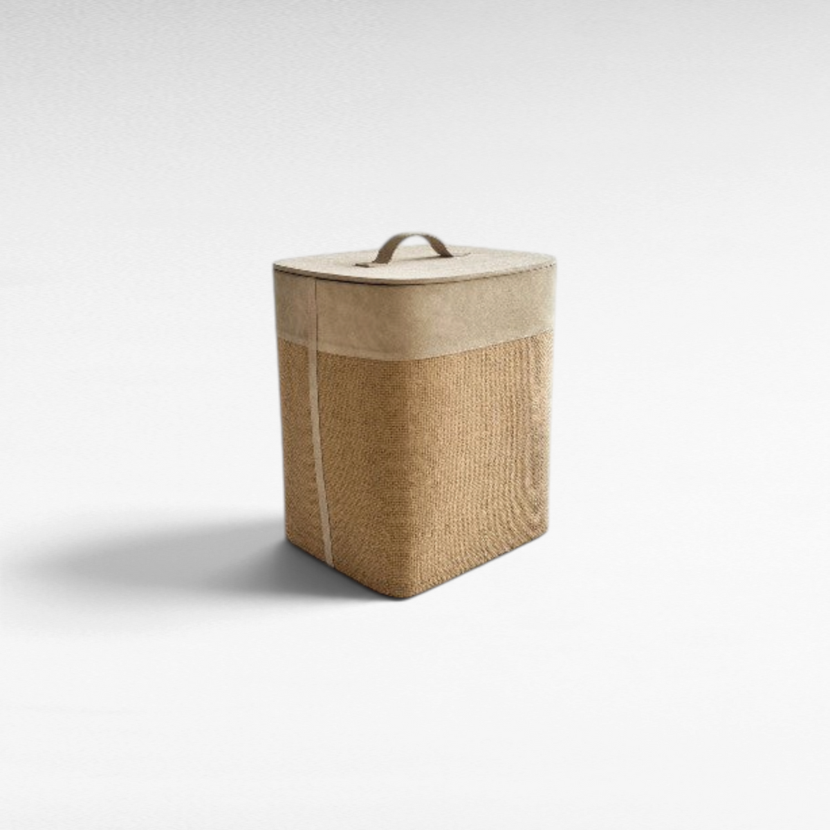 Chora Barefoot Luxury Living beige storage basket with a suede leather lid and textured jute body on a white background
