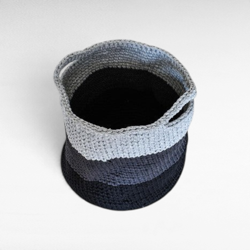 Chora Barefoot Luxury Living handmade cotton laundry basket in grey and black tones with a woven texture