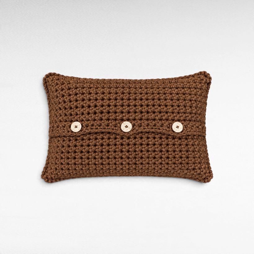 Chora Barefoot Luxury Living brown cotton rope decorative pillow with three wooden buttons and textured crochet knit