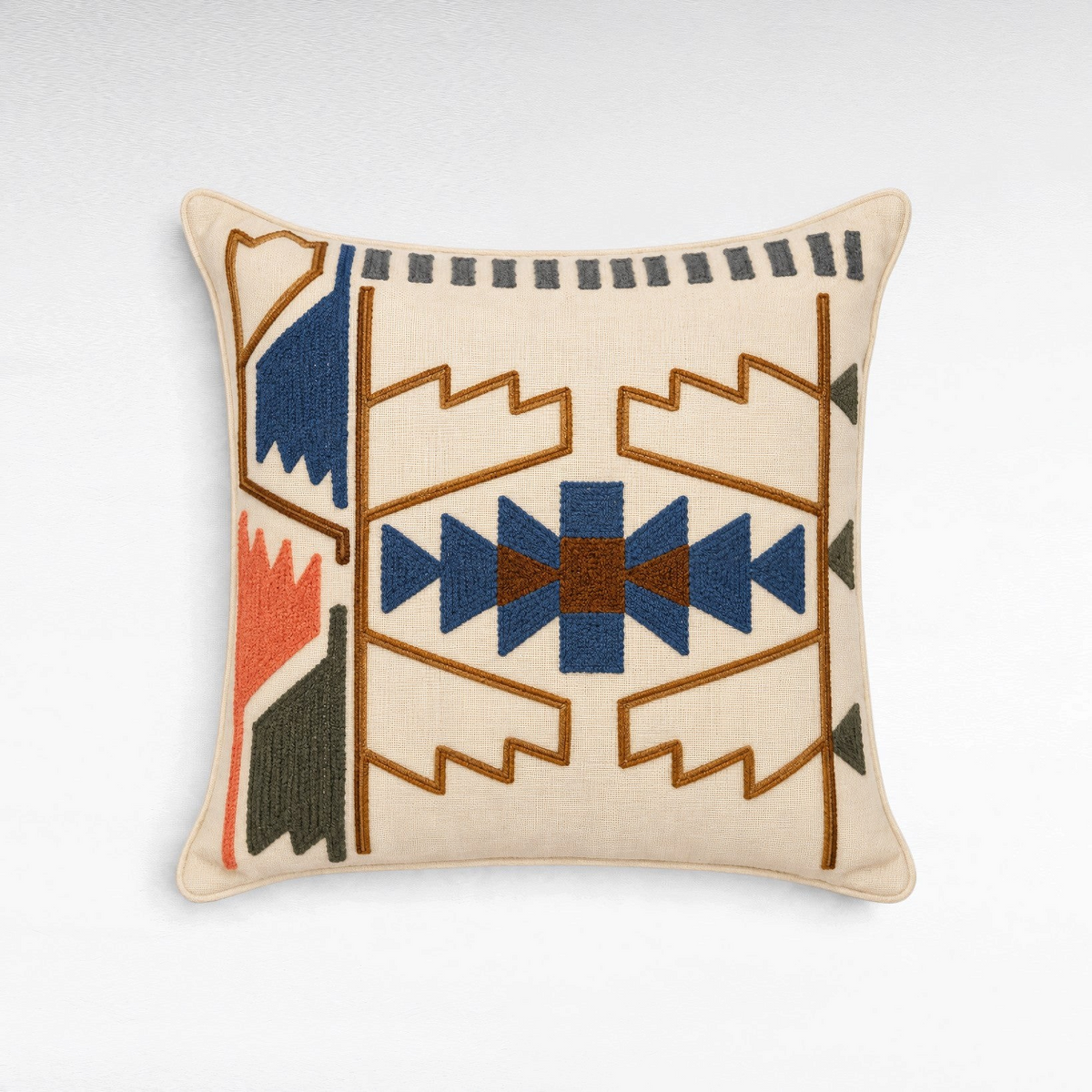 Chora Barefoot Luxury Living square decorative pillow with cream fabric and geometric multi-colored embroidery