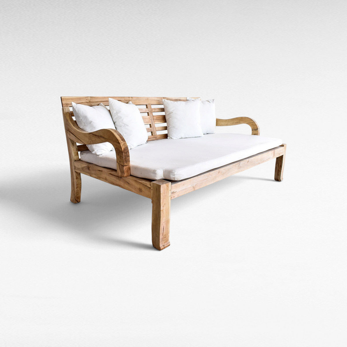 Chora Barefoot Luxury Living bleached teak wood double sofa daybed with white mattress and four matching cushions.