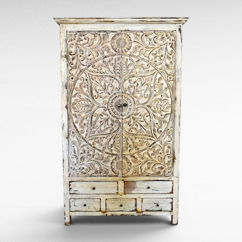 Chora Barefoot Luxury Living distressed white carved wood cupboard with 6 drawers and ornate floral detailing.