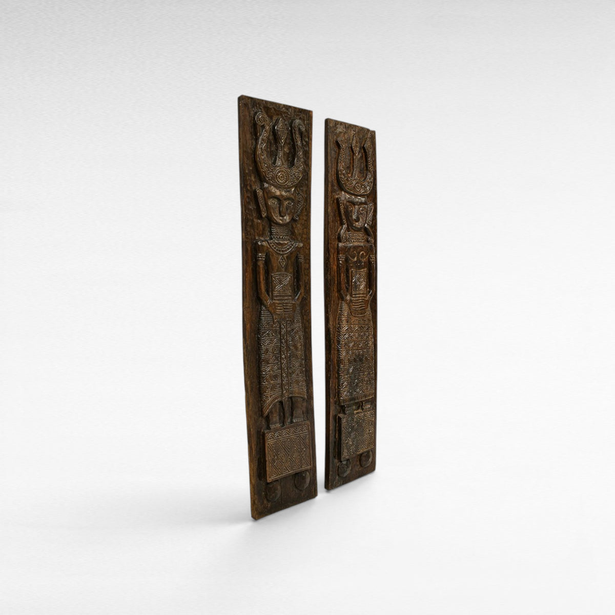 Chora Barefoot Luxury Living set of two carved wood statues, man and woman figures, dark brown, tribal design, 210cm tall