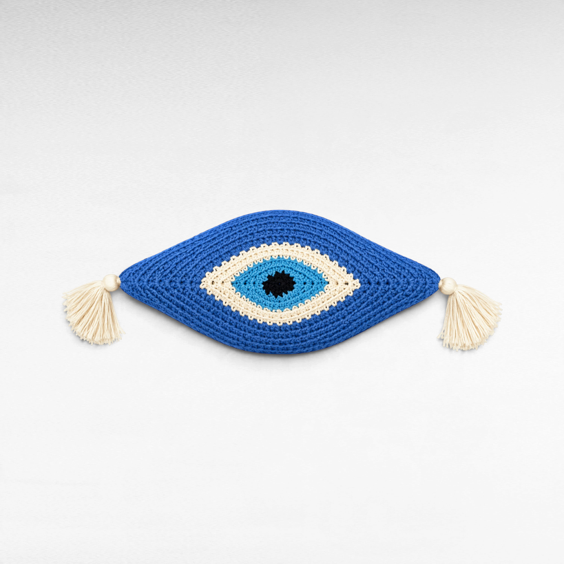 Chora Barefoot Luxury Living cotton eye pillow in blue, white, and black with decorative side tassels