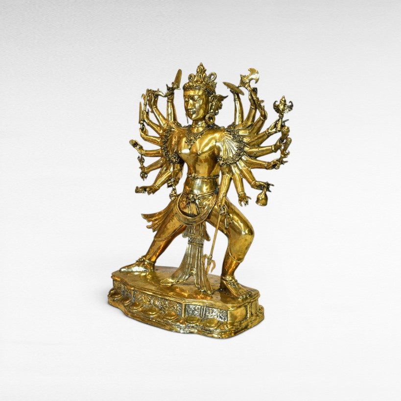 Chora Barefoot Luxury Living golden brass multi-armed deity figurine, ornate details, W95 H120 cm.