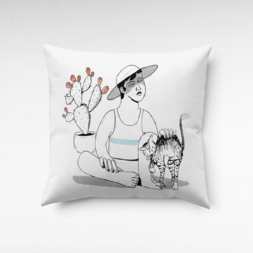 Chora Barefoot Luxury Living Manolis square throw pillow featuring a whimsical illustration of a person and cat