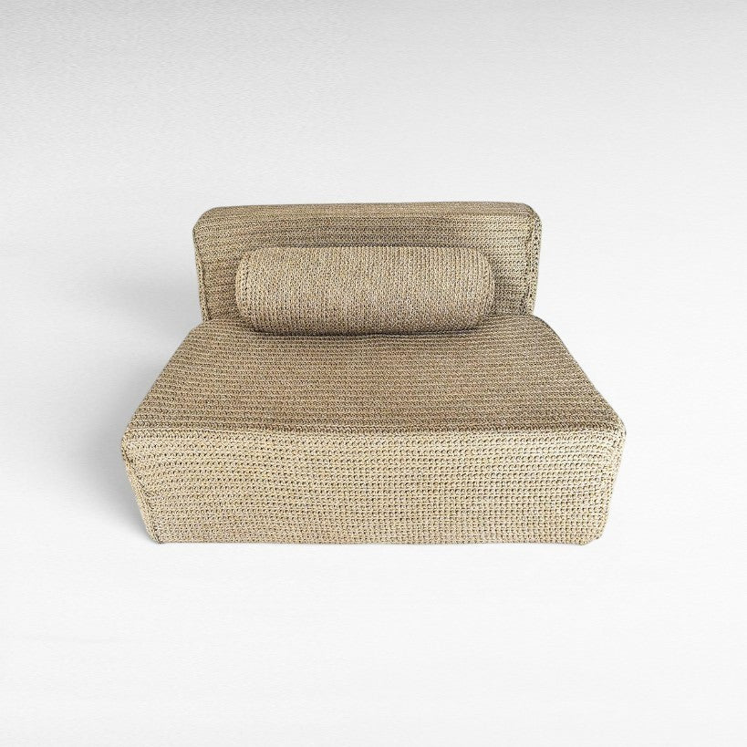 Chora Barefoot Luxury Living natural rope sofa with a cylindrical back cushion in a minimalist woven design.