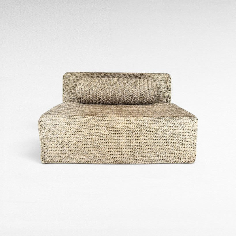 Chora Barefoot Luxury Living natural rope sofa with a low-profile design and matching cylindrical bolster cushion.