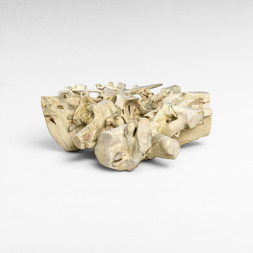Chora Barefoot Luxury Living natural wood coffee table with intricate root-like base and organic shape.