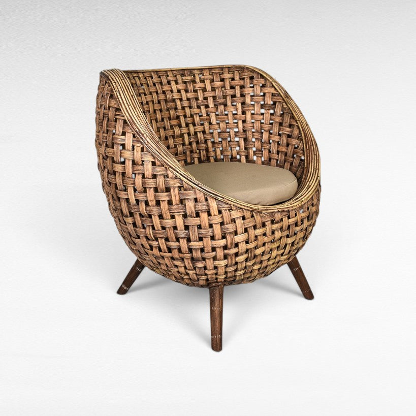 Chora Barefoot Luxury Living woven rattan egg chair with tan cushion and wooden legs