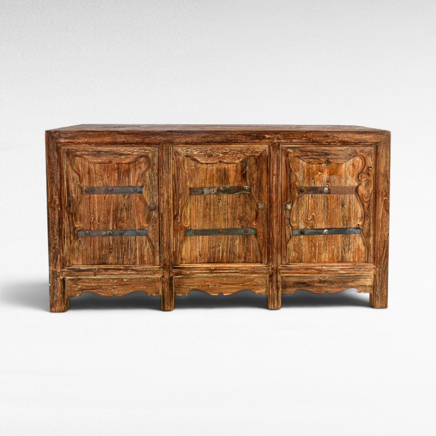 Chora Barefoot Luxury Living rustic wood buffet with three doors, metal accents, and carved details.