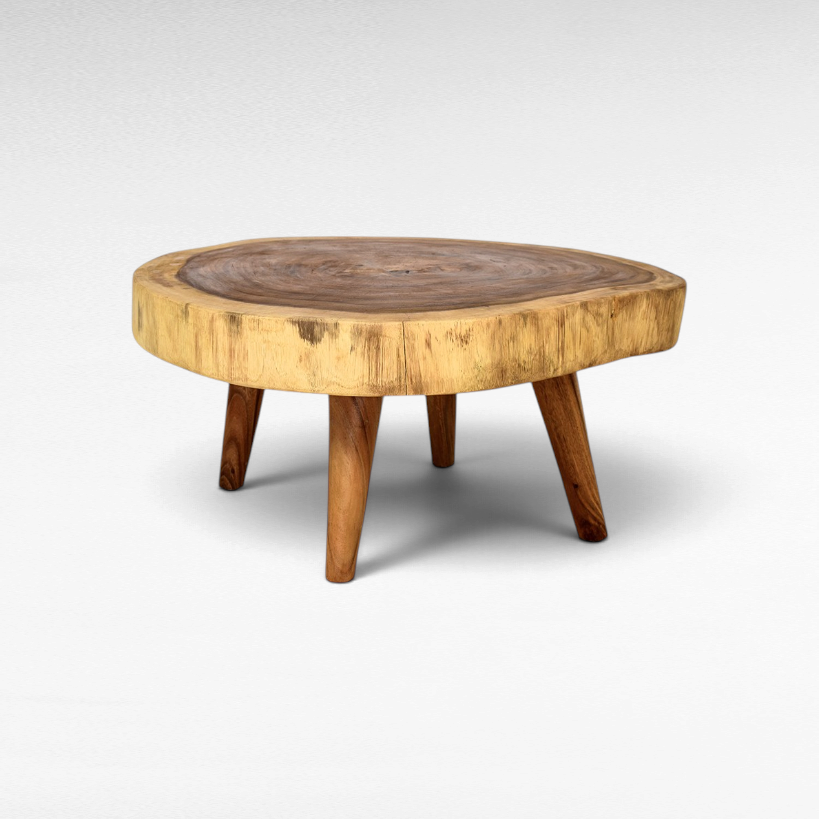 Chora Barefoot Luxury Living circular suar wood coffee table with natural grain and sturdy wooden legs
