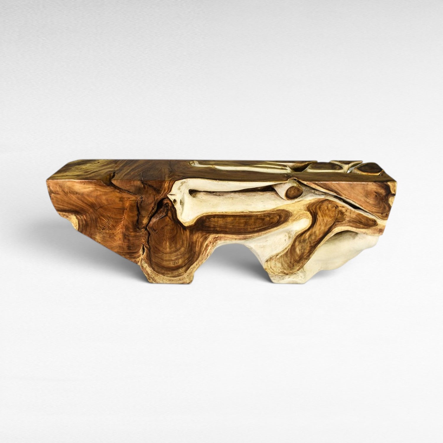 Chora Barefoot Luxury Living natural and bleached suar wood console table with organic, carved details.