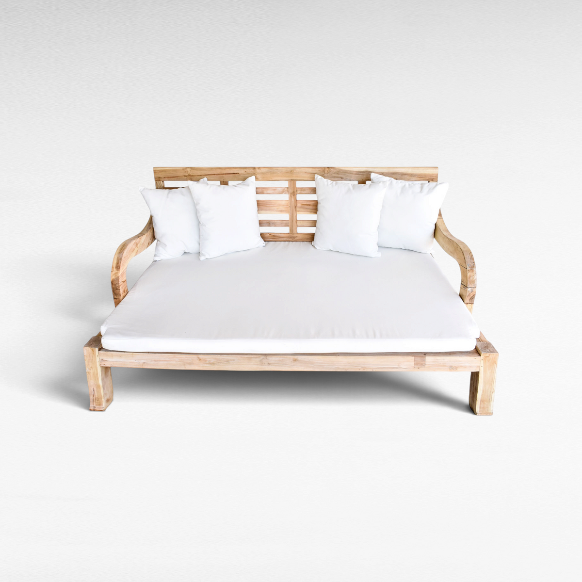 Chora Barefoot Luxury Living teak wood double sofa daybed in a bleached finish with white mattress and pillows