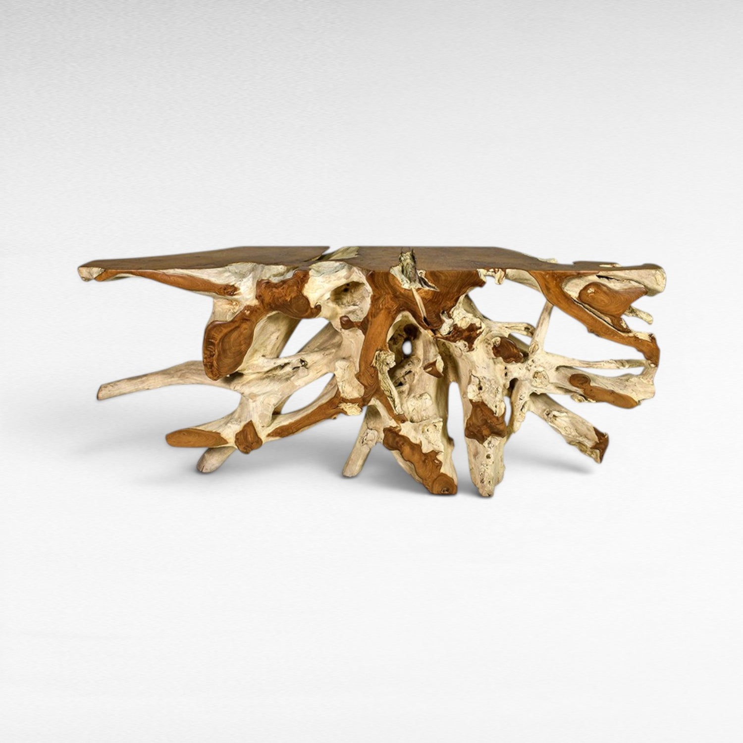 Chora Barefoot Luxury Living console table made of natural teak wood root, showcasing organic shapes and a rustic, artistic design.