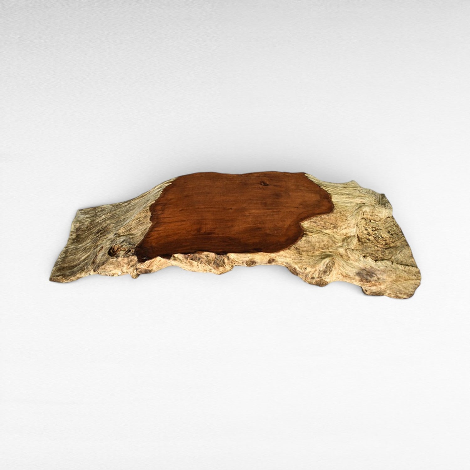 Chora Barefoot Luxury Living bleached and natural teak wood coffee table with live edge. Features a rich brown wood inlay.