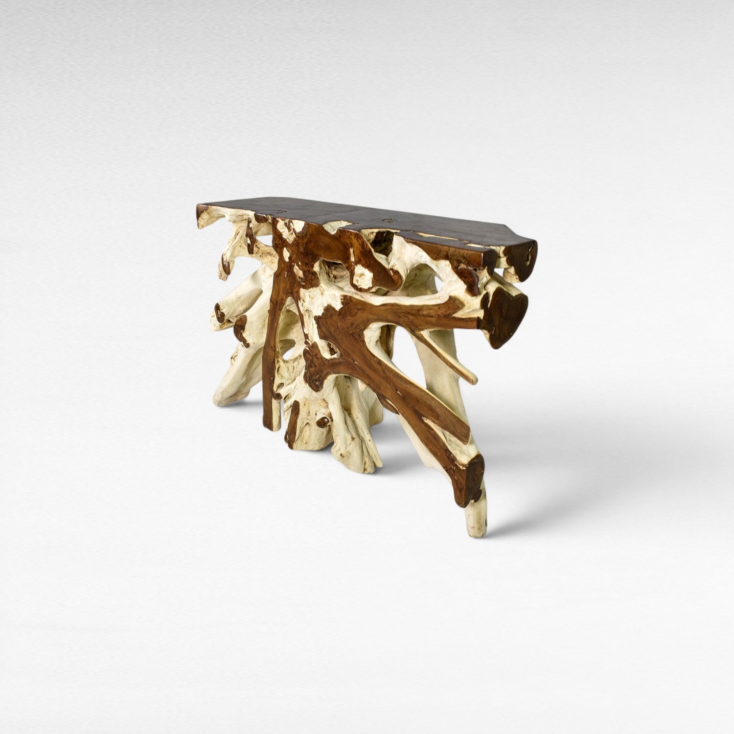 Chora Barefoot Luxury Living bleached and natural teak wood console table with organic root base.