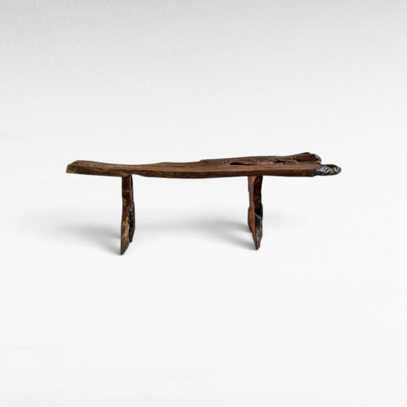 Chora Barefoot Luxury Living natural teak wood console table with a rustic live edge design on a white background.