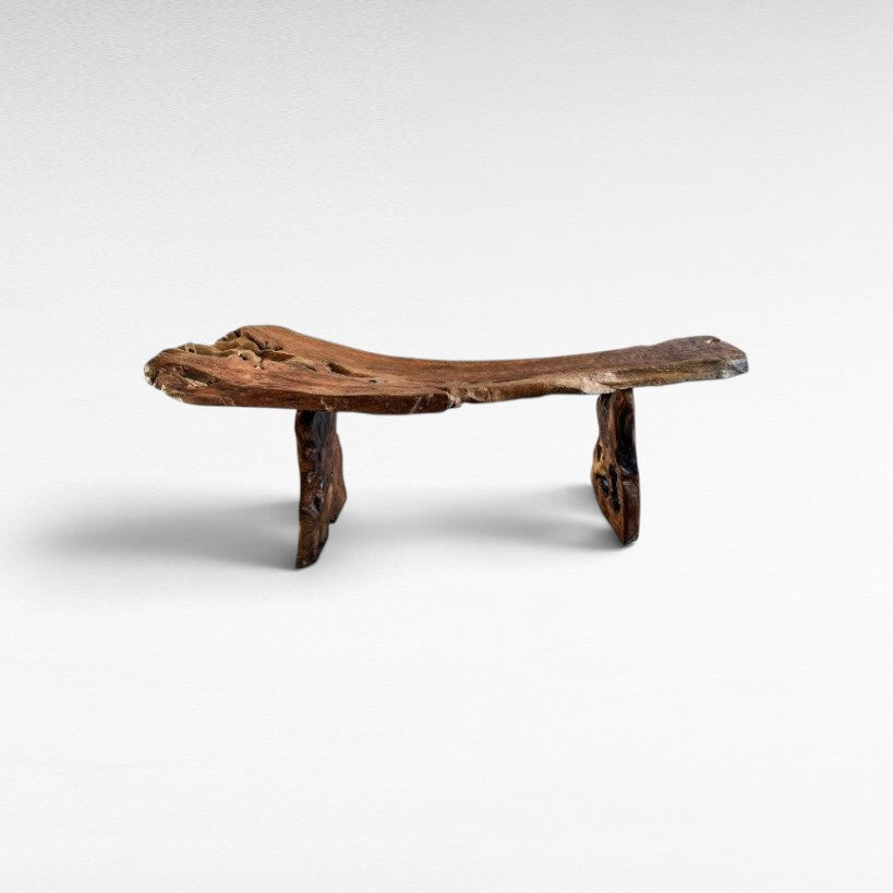 Chora Barefoot Luxury Living natural teak wood console table with a rustic live edge design on a white background