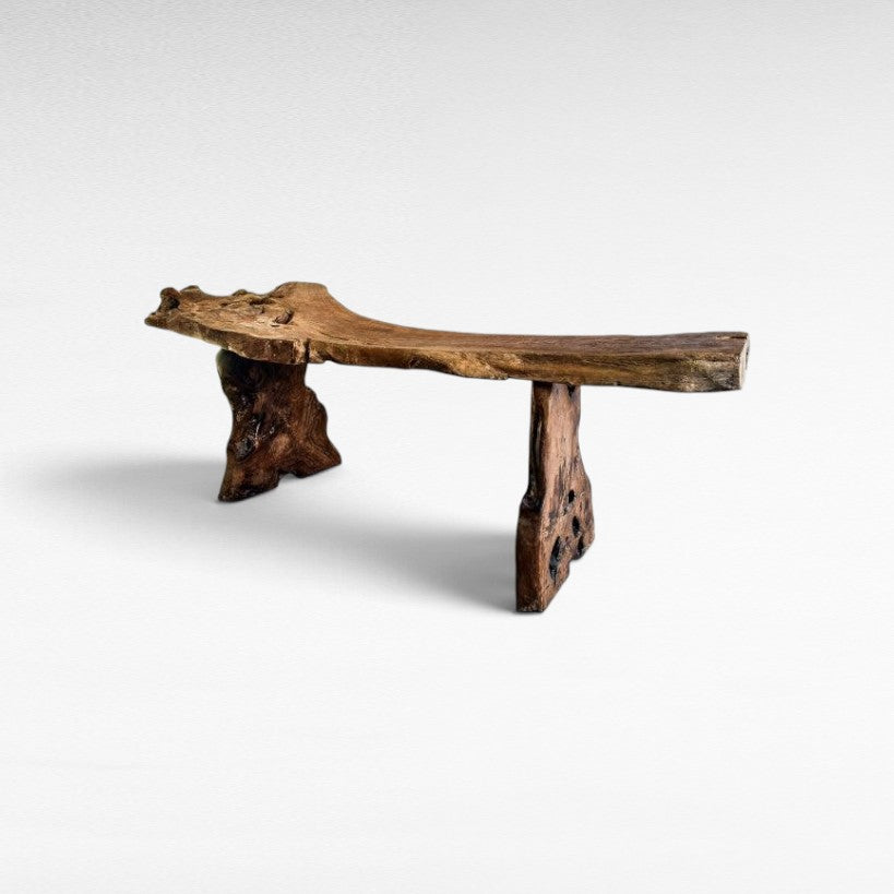 Chora Barefoot Luxury Living natural teak wood console table with a rustic live edge design on a white background.