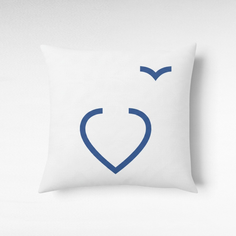 Chora Barefoot Luxury Living square white throw pillow with a blue heart and seagull graphic print