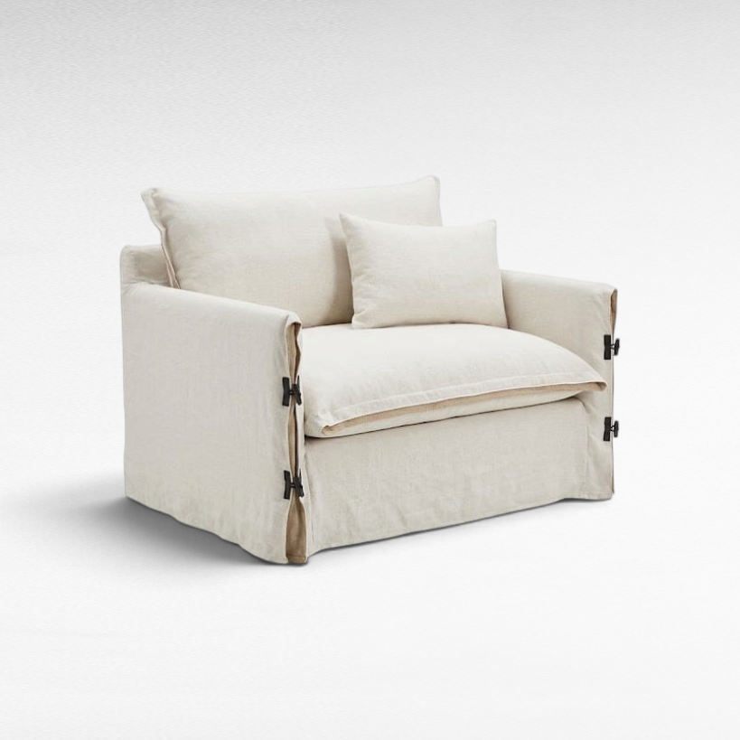 Chora Barefoot Luxury Living white linen two-seater sofa with side tie-up detailing and plush cushions