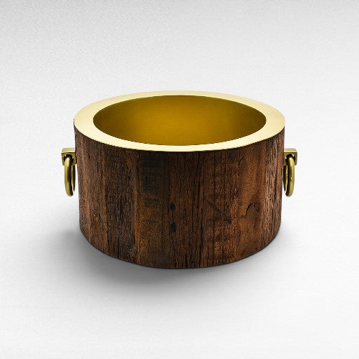 Chora Barefoot Luxury Living large round ice bucket made of natural wood with shiny gold finishing and brass handles.