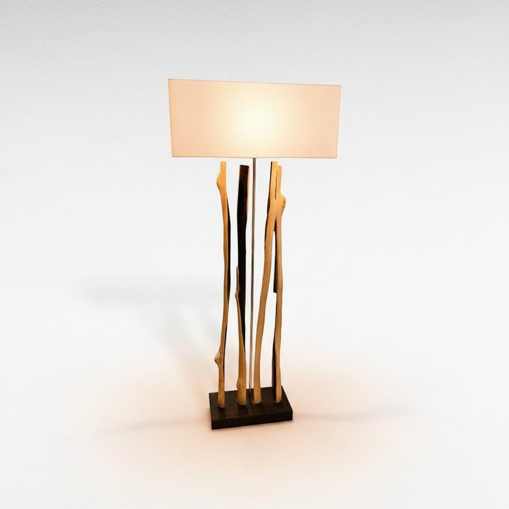 Chora Barefoot Luxury Living wooden floor lamp with a rectangular shade and natural branch-style base.