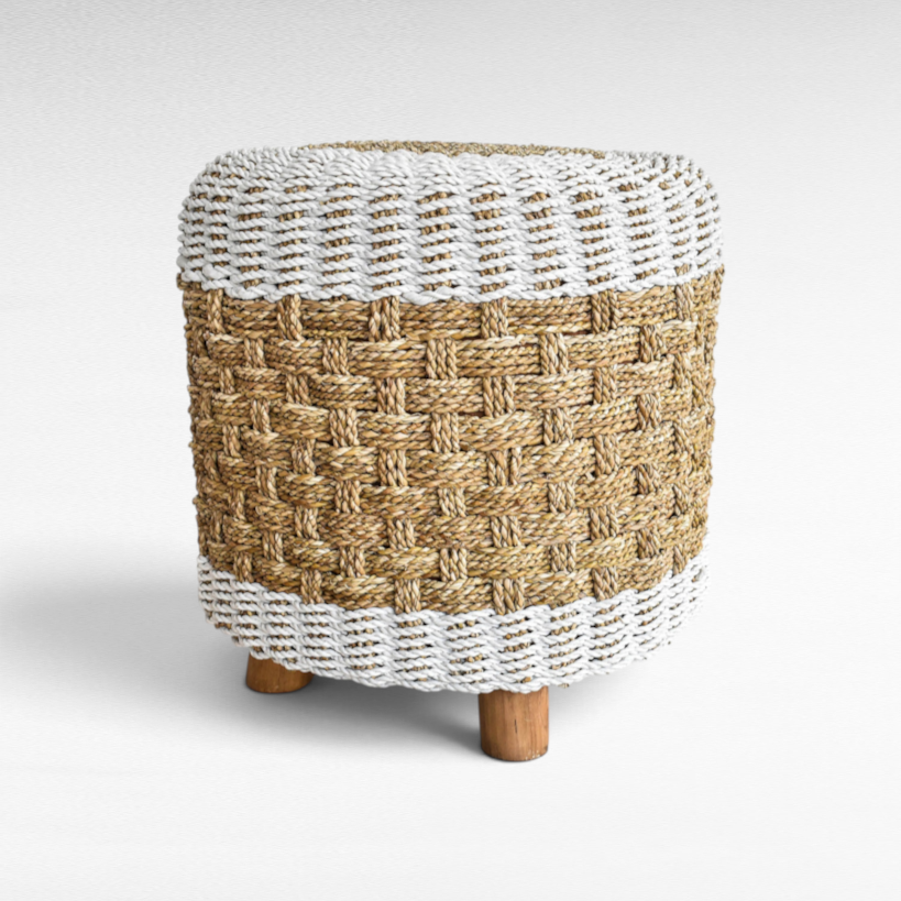 Chora Barefoot Luxury Living round woven stool with natural jute and white rope pattern on small wooden legs
