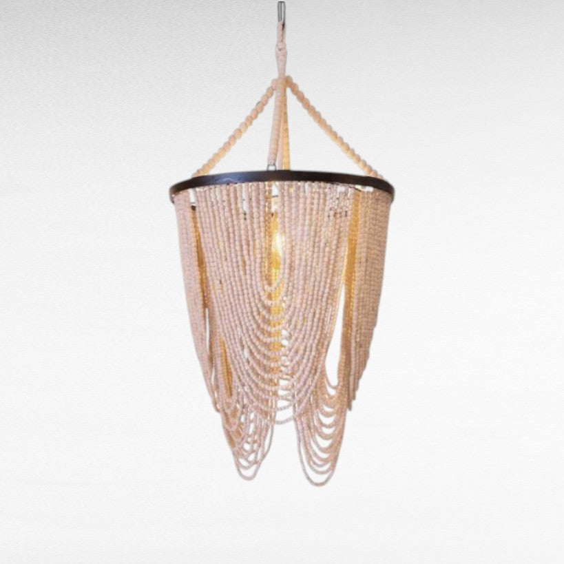 Chora Barefoot Luxury Living Ivory Cascade beaded chandelier with loops of wooden beads on a metal frame.