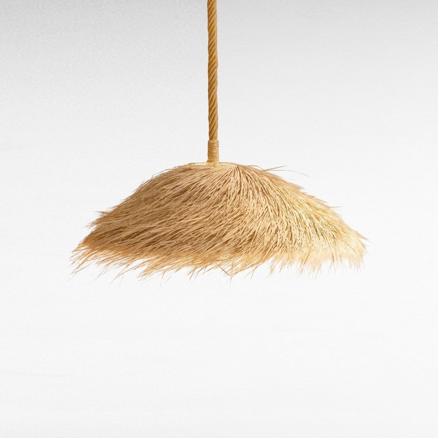 Chora Barefoot Luxury Living natural palm leaf pendant light with a triangle shape and frayed edges, 80cm diameter.