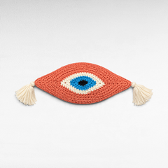 Chora Barefoot Luxury Living handmade knitted eye pillow in coral, blue, and white with decorative side tassels