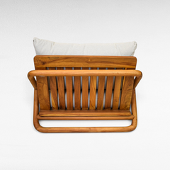 Chora Barefoot Luxury Living teak wood sofa with slatted backrest and light grey cushions, rear view