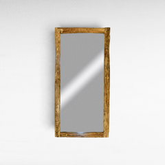 Chora Barefoot Luxury Living rectangular mirror with a rustic, natural teak wood frame on a white wall.