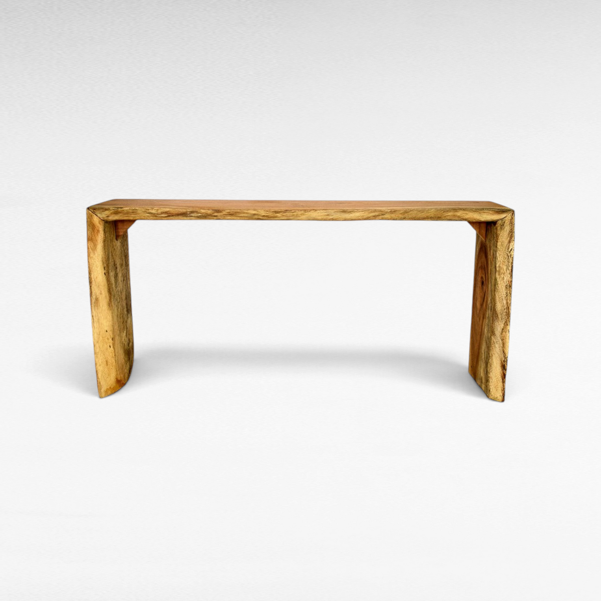 Chora Barefoot Luxury Living natural teak wood console table with a rustic live edge finish