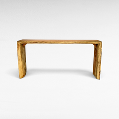 Chora Barefoot Luxury Living natural teak wood console table with a rustic live edge finish
