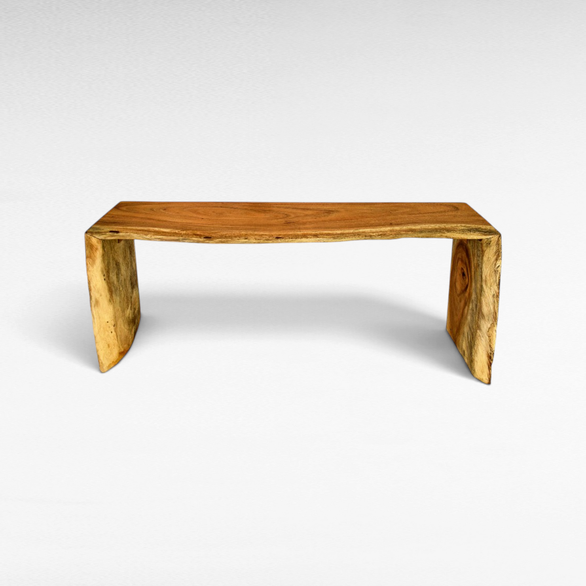 Chora Barefoot Luxury Living natural teak wood console table with a live edge design on a white background