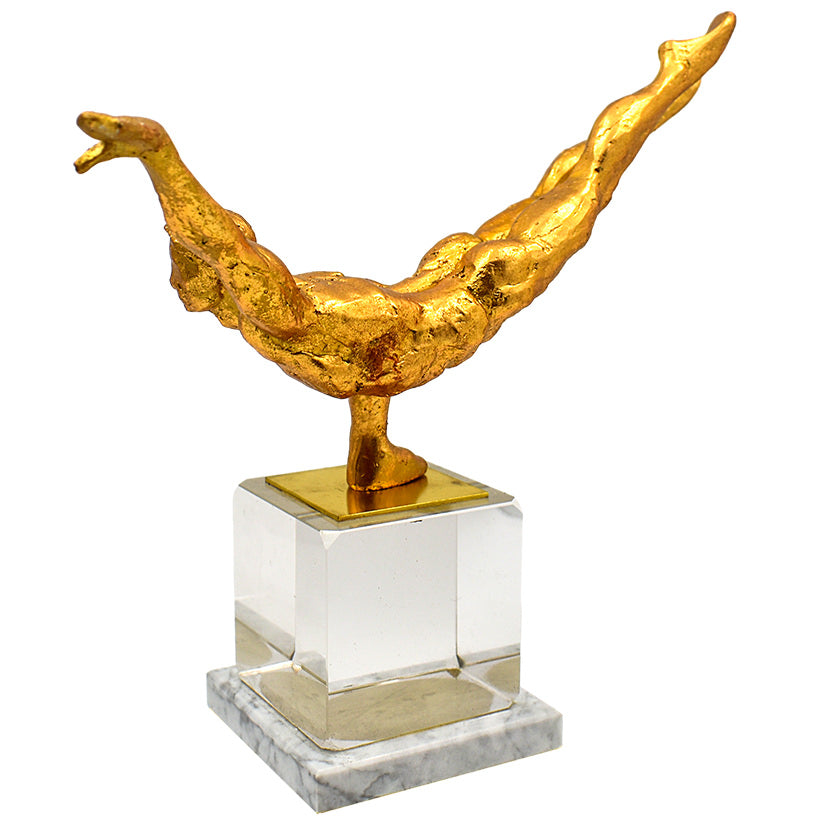 GOLDEN FIGURINE ON STAND