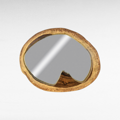 Chora Barefoot Luxury Living round mirror with a natural organic souar wood frame and unique live edge detail