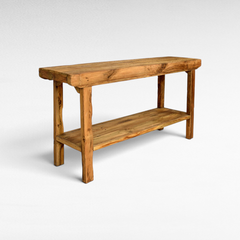 Chora Barefoot Luxury Living natural solid wood console table with a lower shelf and rustic grain finish.