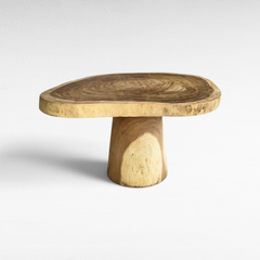 Chora Barefoot Luxury Living live edge suar wood dining table with a thick circular pedestal base