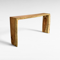 Chora Barefoot Luxury Living natural teak wood console table with a live edge design and minimalist waterfall frame.