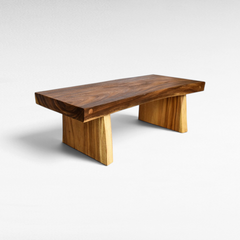 Chora Barefoot Luxury Living rectangular suar wood coffee table with a natural live edge finish and sturdy base