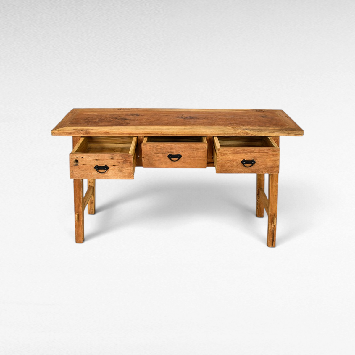 Chora Barefoot Luxury Living rustic teak wood console table with three open drawers and black metal hardware