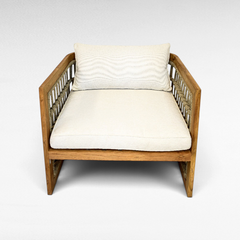Chora Barefoot Luxury Living teak wood armchair with grey rope accents and plush off-white cushions