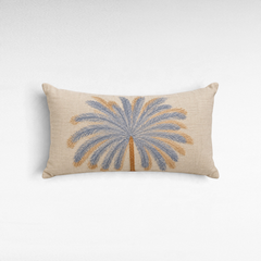 Chora Barefoot Luxury Living rectangular linen pillow featuring an embroidered blue and gold palm tree design.